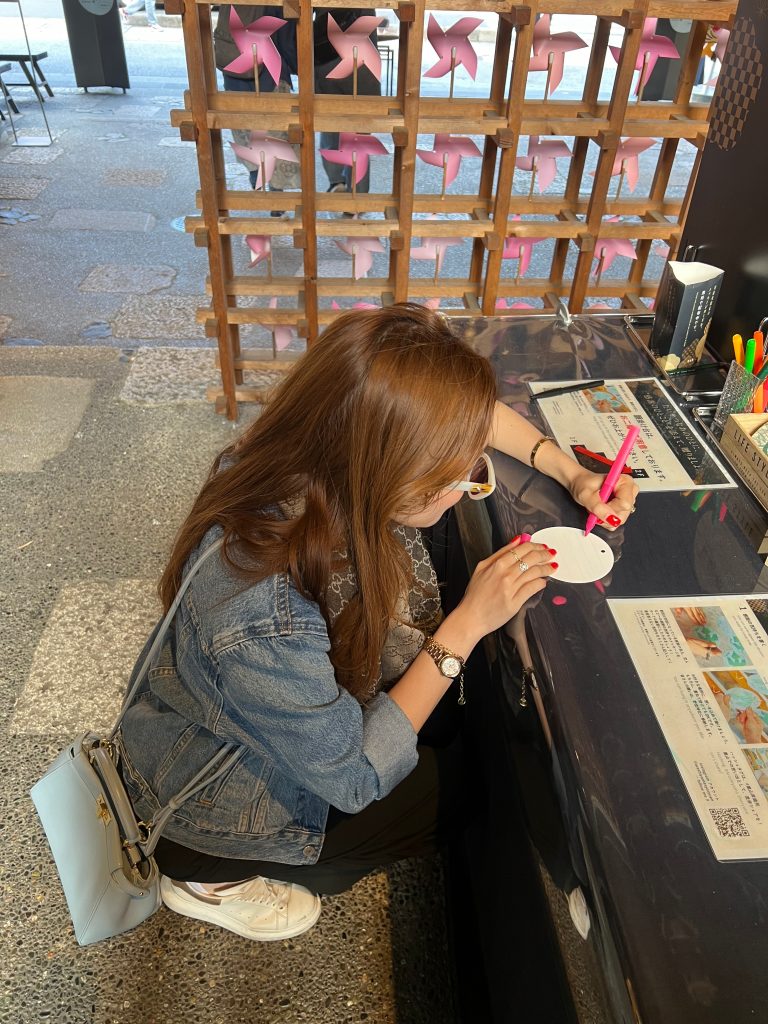 Taking a quiet moment to write intentions, symbolising reflection and starting with intention.