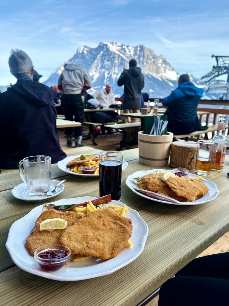 Taking a mindful break in the mountains, enjoying food and presence as a way to start with intention.