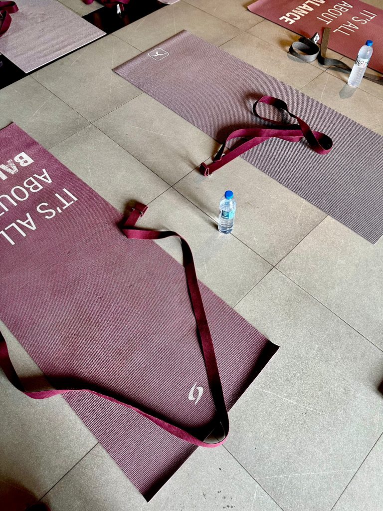 Yoga mats prepared for a class, symbolising mindful movement and intentional living.